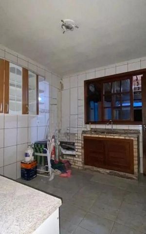 Casa à venda com 125m², 2 quartos e 2 vagas Casa à venda com 125m², 2 quartos e 2 vagasCozinha