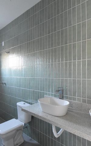 Casa de condomínio para alugar com 152m², 3 quartos e 2 vagasBanheiro da Suíte 1