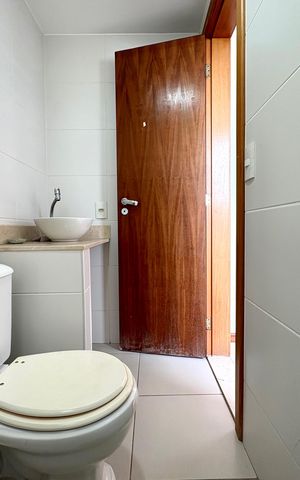 Casa de condomínio à venda com 282m², 4 quartos e 3 vagasBanheiro Social