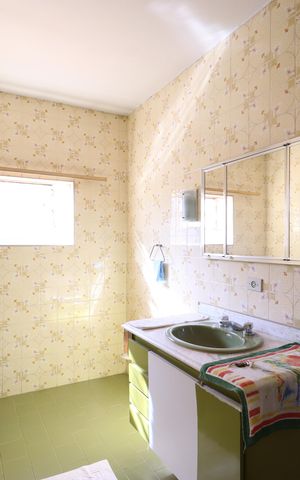 Casa à venda com 217m², 2 quartos e 2 vagasBanheiro
