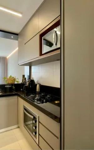 Apartamento à venda com 72m², 2 quartos e 2 vagas Apartamento à venda com 72m², 2 quartos e 2 vagasCozinha e Área de Serviço