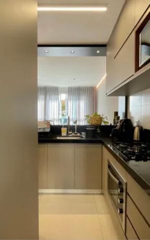 Apartamento à venda com 72m², 2 quartos e 2 vagas Apartamento à venda com 72m², 2 quartos e 2 vagasCozinha e Área de Serviço