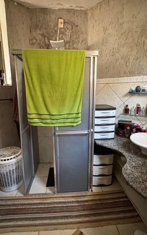 Casa à venda com 400m², 4 quartos e 5 vagas Casa à venda com 400m², 4 quartos e 5 vagasBanheiro da Suíte 1