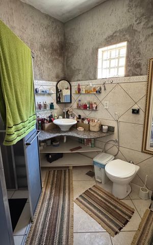 Casa à venda com 400m², 4 quartos e 5 vagas Casa à venda com 400m², 4 quartos e 5 vagasBanheiro da Suíte 1