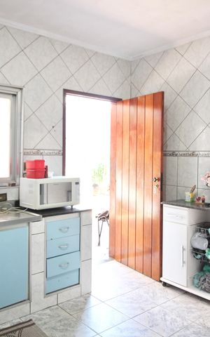Casa à venda com 300m², 4 quartos e 10 vagas Casa à venda com 300m², 4 quartos e 10 vagasCozinha