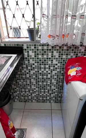 Apartamento à venda com 52m², 3 quartos e 2 vagas Apartamento à venda com 52m², 3 quartos e 2 vagasCozinha e Área de Serviço