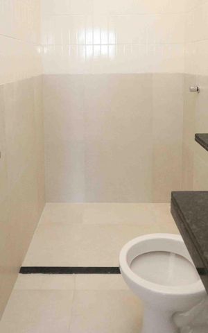 Casa à venda com 104m², 3 quartos e 2 vagas Casa à venda com 104m², 3 quartos e 2 vagasBanheiro da Suite