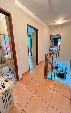 Casa à venda com 120m², 3 quartos e 2 vagasCorredor