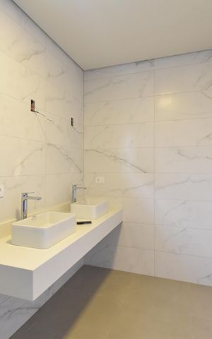 Casa de condomínio à venda com 234m², 3 quartos e 4 vagasBanheiro da Suíte 1