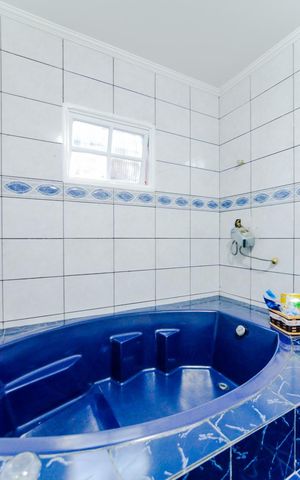 Casa à venda com 320m², 3 quartos e 3 vagasBanheiro da Suíte 