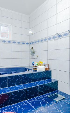 Casa à venda com 320m², 3 quartos e 3 vagasBanheiro da Suíte 