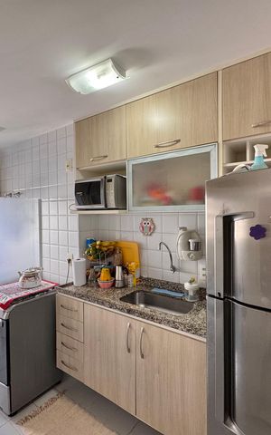 Apartamento à venda com 70m², 2 quartos e 1 vaga Apartamento à venda com 70m², 2 quartos e 1 vagaCozinha e Área de Serviço