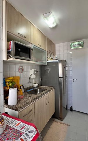 Apartamento à venda com 70m², 2 quartos e 1 vaga Apartamento à venda com 70m², 2 quartos e 1 vagaCozinha e Área de Serviço