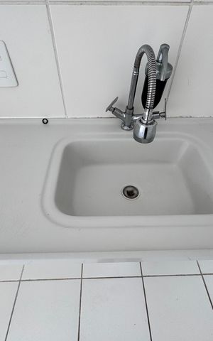 Apartamento à venda com 49m², 2 quartos e 1 vaga Apartamento à venda com 49m², 2 quartos e 1 vagaCozinha e Área de Serviço