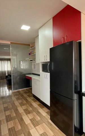 Casa à venda com 99m², 2 quartos e 2 vagas Casa à venda com 99m², 2 quartos e 2 vagasCozinha