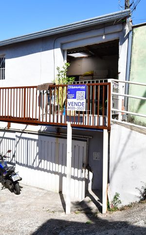Casa à venda com 50m², 2 quartos e 3 vagasFachada / Placa