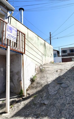 Casa à venda com 50m², 2 quartos e 3 vagasFachada / Placa
