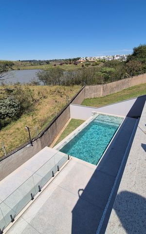 Casa de condomínio à venda com 335m², 3 quartos e 4 vagas Casa de condomínio à venda com 335m², 3 quartos e 4 vagasÁrea externa