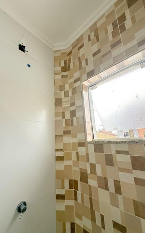 Casa para alugar com 68m², 2 quartos e 2 vagasBanheiro da Suíte 1