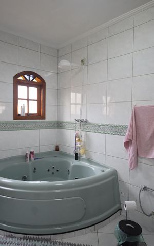 Casa para alugar com 409m², 4 quartos e 4 vagasBanheiro da Suíte 1
