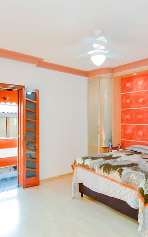 Casa à venda com 389m², 4 quartos e 4 vagasSuíte 1