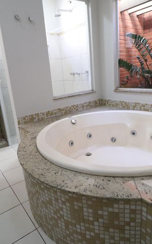 Casa para alugar com 200m², 3 quartos e 4 vagasBanheiro do Quarto 1