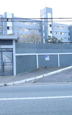 Apartamento à venda com 58m², 2 quartos e 1 vagaPlaca GRANDE instalada na fachada do condomínio, dia 22.08.2026 - Código da placa: SWRM-2198