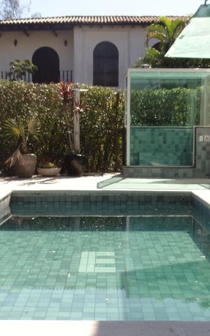 Casa de condomínio à venda com 384m², 7 quartos e 3 vagasÁrea comum - Piscina