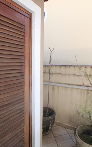 Casa à venda com 207m², 3 quartos e 4 vagasQuarto 1 - Varanda
