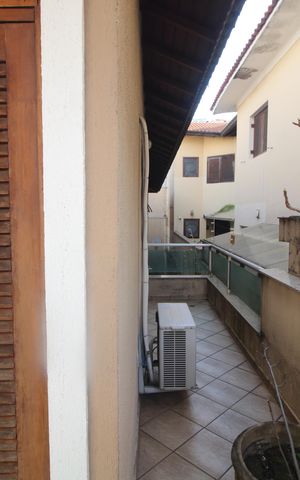 Casa à venda com 207m², 3 quartos e 4 vagasQuarto 1 - Varanda
