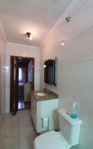 Casa à venda com 180m², 3 quartos e 2 vagasQuarto 1 - Suíte Banheiro 