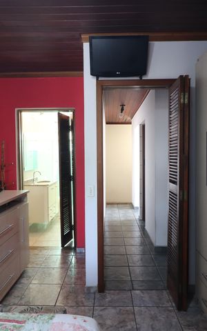 Casa à venda com 180m², 3 quartos e 2 vagasQuarto 1 - Suíte
