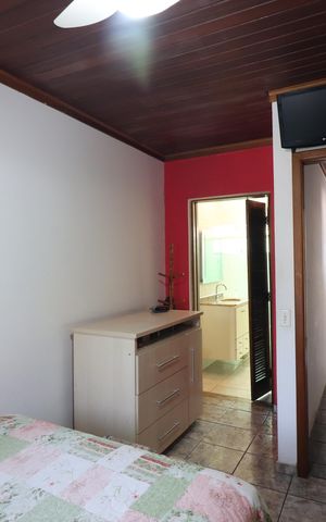Casa à venda com 180m², 3 quartos e 2 vagasQuarto 1 - Suíte