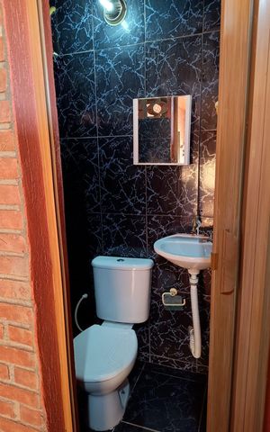 Casa à venda com 260m², 4 quartos e 5 vagas Casa à venda com 260m², 4 quartos e 5 vagasCozinha