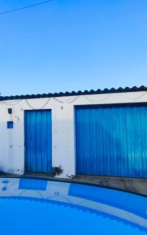Casa à venda com 90m², 2 quartos e 2 vagas Casa à venda com 90m², 2 quartos e 2 vagasFachada