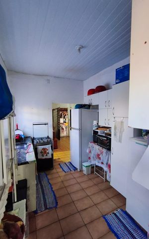 Casa à venda com 90m², 2 quartos e 2 vagas Casa à venda com 90m², 2 quartos e 2 vagasCozinha
