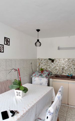 Casa à venda com 110m², 5 quartos e 2 vagasCozinha e Área de Serviço