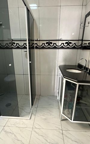 Casa à venda com 308m², 3 quartos e 2 vagas Casa à venda com 308m², 3 quartos e 2 vagasBanheiro da Suíte 1