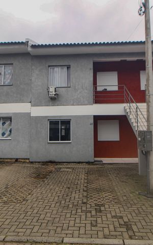 Casa de condomínio à venda com 42m², 2 quartos e 1 vaga Casa de condomínio à venda com 42m², 2 quartos e 1 vagagaragem/Fachada