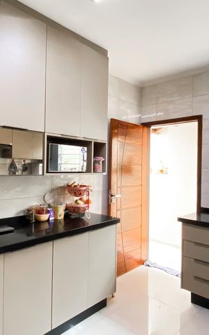 Casa à venda com 105m², 3 quartos e 2 vagas Casa à venda com 105m², 3 quartos e 2 vagasCozinha