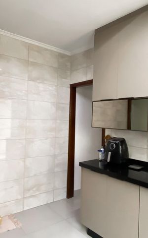 Casa à venda com 105m², 3 quartos e 2 vagas Casa à venda com 105m², 3 quartos e 2 vagasCozinha
