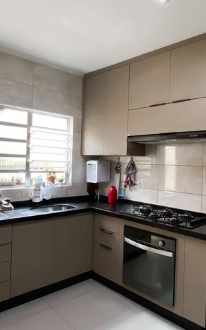 Casa à venda com 105m², 3 quartos e 2 vagas Casa à venda com 105m², 3 quartos e 2 vagasCozinha