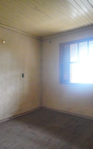 Casa à venda com 48m², 2 quartos e 2 vagasQuarto 1