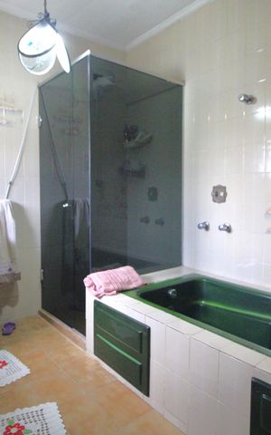 Casa à venda com 180m², 4 quartos e 3 vagasBanheiro da suíte
