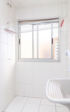 Apartamento à venda com 48m², 2 quartos e 1 vaga Apartamento à venda com 48m², 2 quartos e 1 vagaCozinha e Área de Serviço