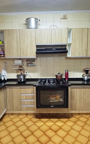 Casa à venda com 144m², 3 quartos e 2 vagas Casa à venda com 144m², 3 quartos e 2 vagasCozinha