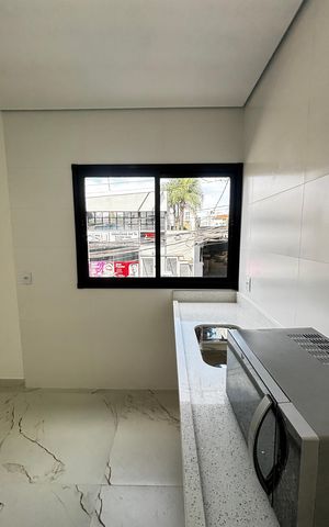 Casa de condomínio à venda com 100m², 3 quartos e 2 vagas Casa de condomínio à venda com 100m², 3 quartos e 2 vagasCozinha