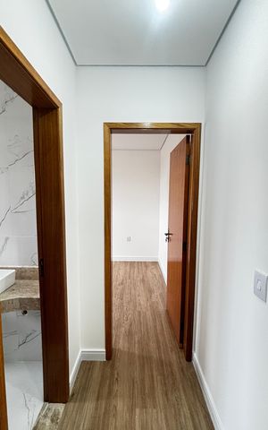 Casa de condomínio à venda com 100m², 3 quartos e 2 vagas Casa de condomínio à venda com 100m², 3 quartos e 2 vagasCorredor
