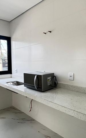 Casa de condomínio à venda com 100m², 3 quartos e 2 vagas Casa de condomínio à venda com 100m², 3 quartos e 2 vagasCozinha