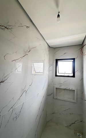 Casa de condomínio à venda com 100m², 3 quartos e 2 vagas Casa de condomínio à venda com 100m², 3 quartos e 2 vagasBanheiro